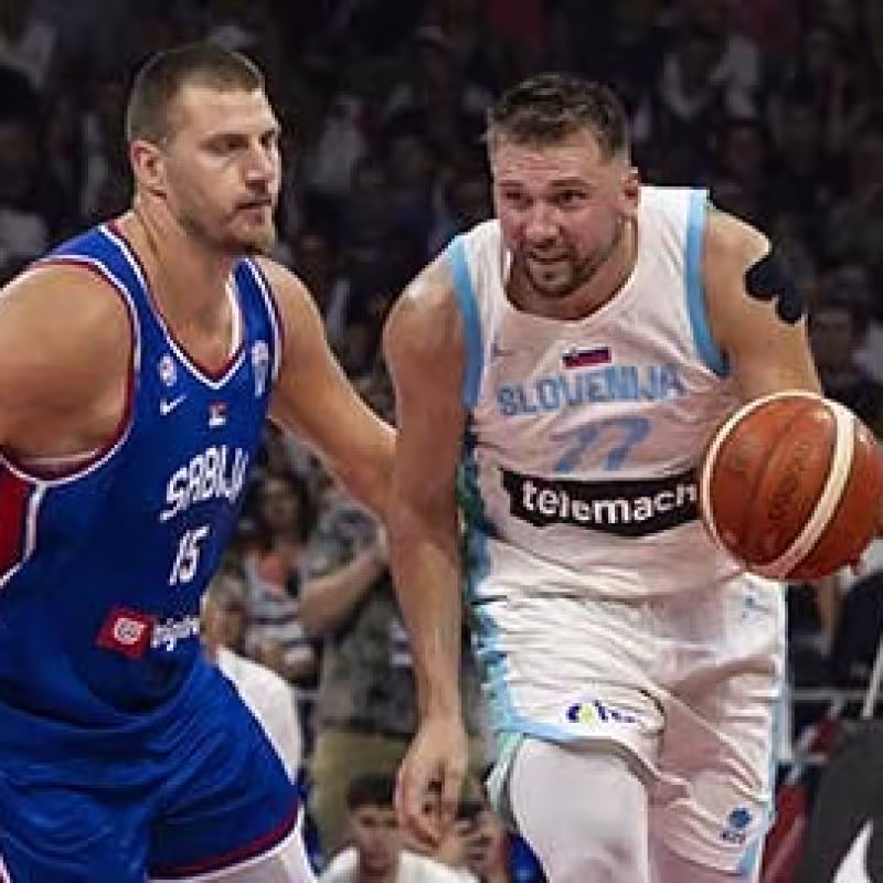 Nikola Jokic, trying to defend Luka Doncic in a friendly match ahead of Eurobasket 2025.