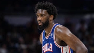 The NBA suspends thug Joel Embiid for pushing a journalist!